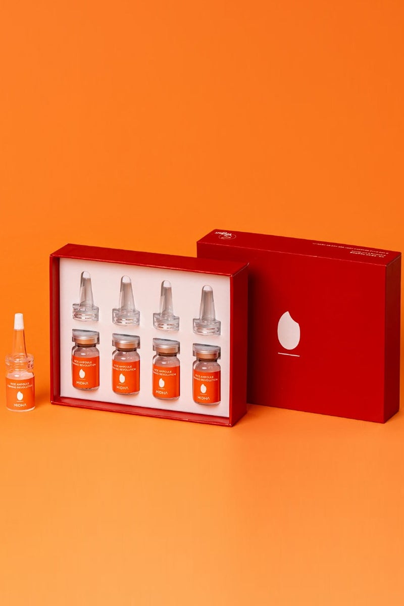 Midha Rice Ampoule Firming Set 7ml x 4 Vials is a firming solution that combines a rice-based serum and a lightweight ampoule, designed to tighten, smooth, and brighten the complexion for a more youthful, wrinkle-free appearance.  Ideal for daily use on all skin types, this vegan-friendly set enhances hydration, and helps protect against environmental stressors—leaving skin visibly firmer and radiant. - Image 3