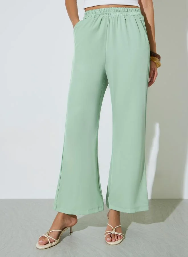 ستايلي Green Solid Elastic Waist Wide Leg Pants