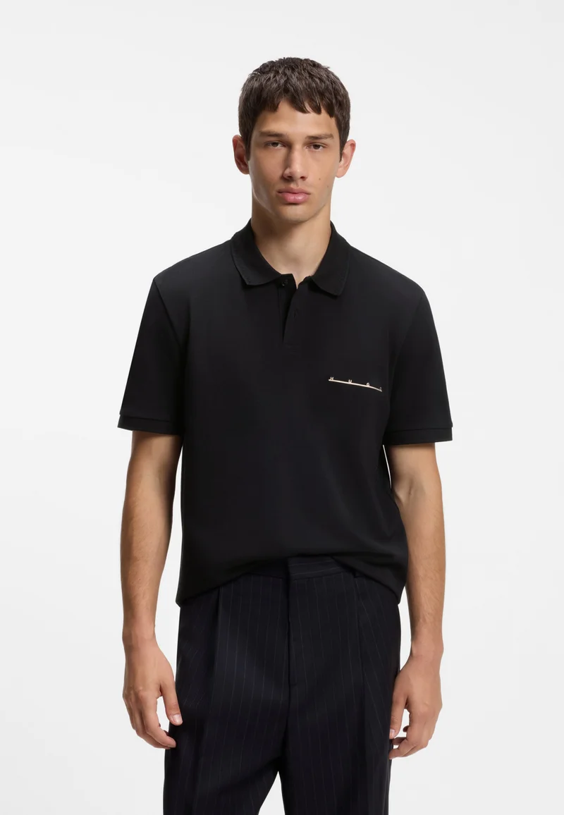Polo shirt in cotton piqué with logo detail