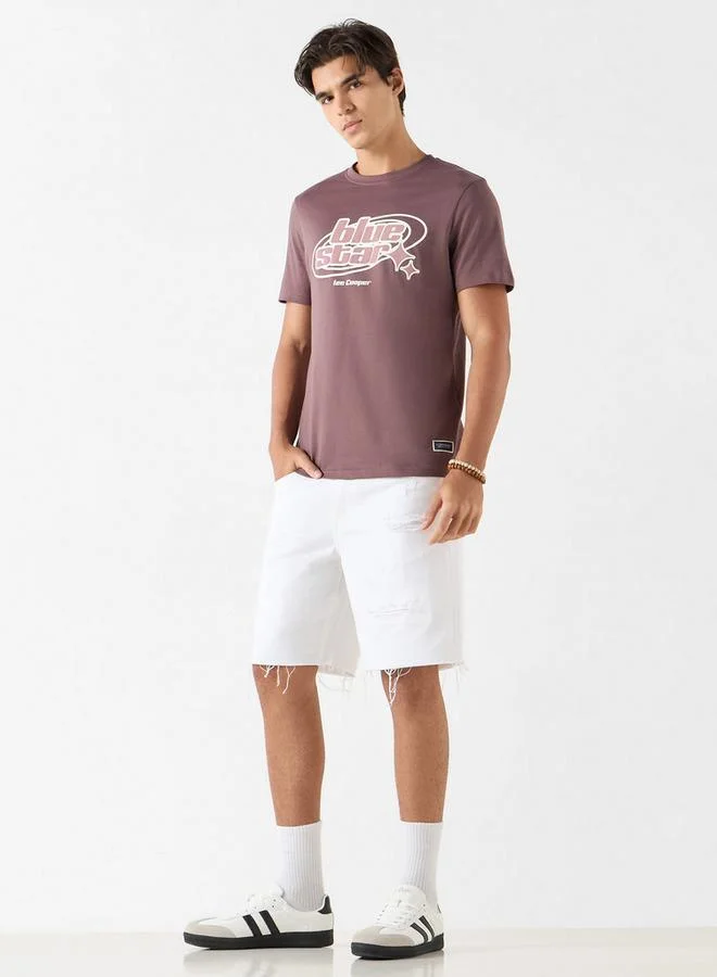 لي كوبر تيشيرت بياقة ضيّقة وأكمام قصيرة وطبعات شعار من لي كوبر