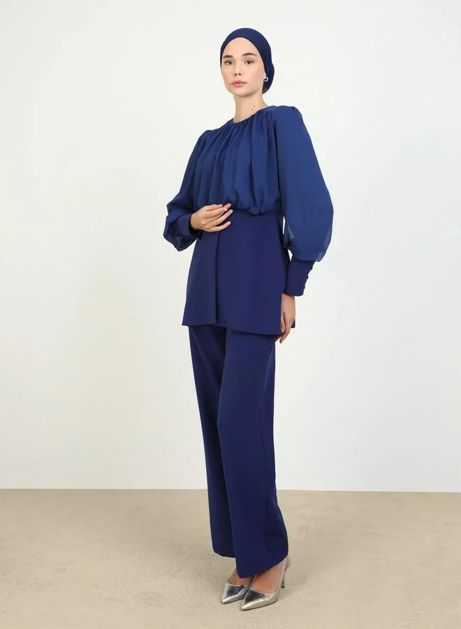 رفقة من مودانيسا رفقة من مودانيسا تونيك أزرق داكن بأكمام أسقفية مع بنطلون طقم