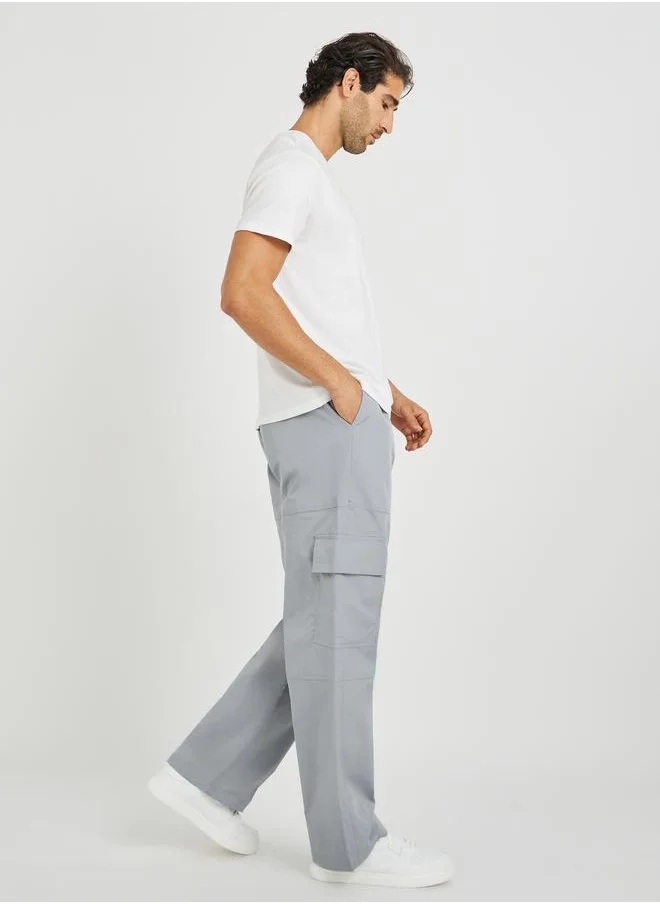ستايلي Styli Men Grey Solid Oversized Open Hem Cargo Joggers with Zipper Pockets