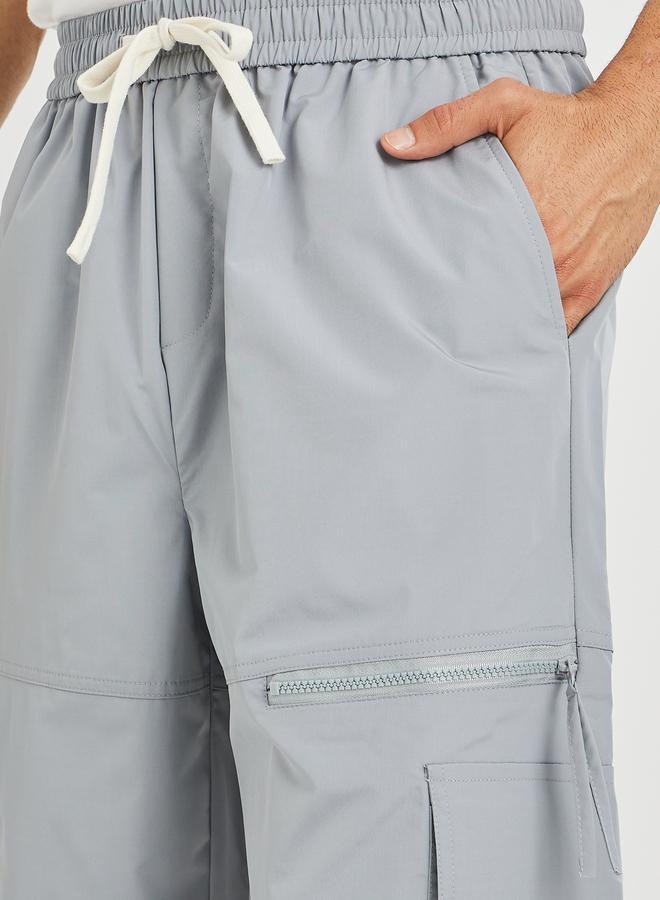 ستايلي بنطلون رياضي رجالي رمادي واسع بجيوب بسحاب - Image 3