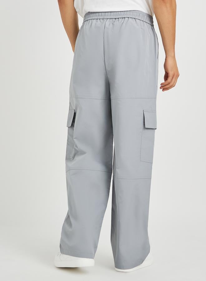 ستايلي بنطلون رياضي رجالي رمادي واسع بجيوب بسحاب - Image 4