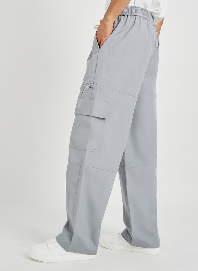 ستايلي بنطلون رياضي رجالي رمادي واسع بجيوب بسحاب - Image 1