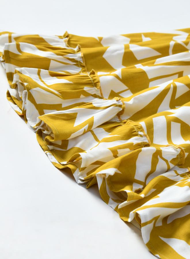 بيلا مودا فستان قطن قصير الأكمام بطبعات مجردة وحواف مكشكشة من بيلا مودا - Image 3