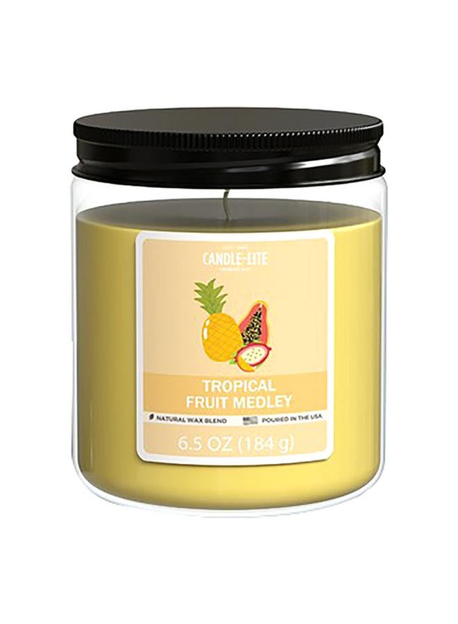 CANDLE-LITE Natural Wax Blend Highly Fragranced Tropical Fruit Medley Scented Jar Candle with Top Lid Yellow 6.5oz 4603099