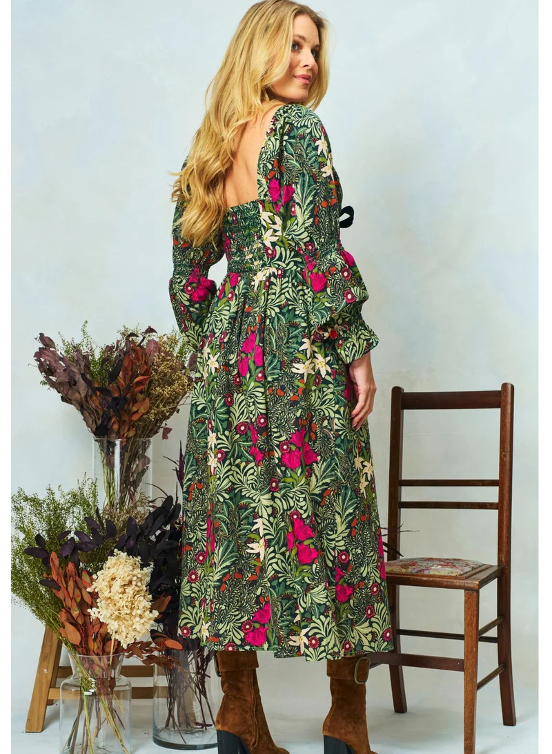 هوب اند ايفي فستان ماكسي طويل بأكمام طويلة وربطة أمامية - جمعية ويليام موريس