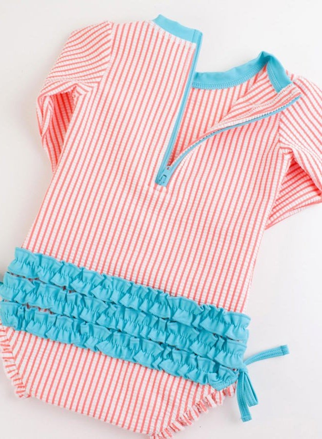 RuffleButts Coral Seersucker Long Sleeve One Piece Rash Guard - 6-12m - Image 5
