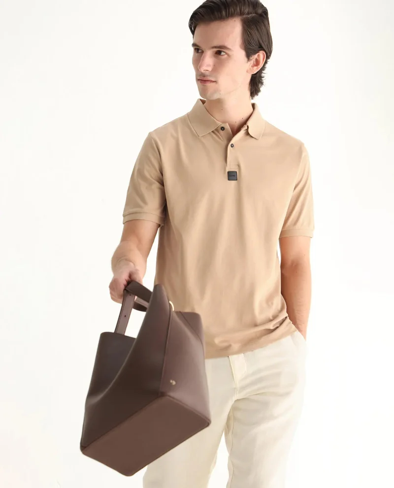 Rare Rabbit Men's Silicon Badge Branded Solid Polo