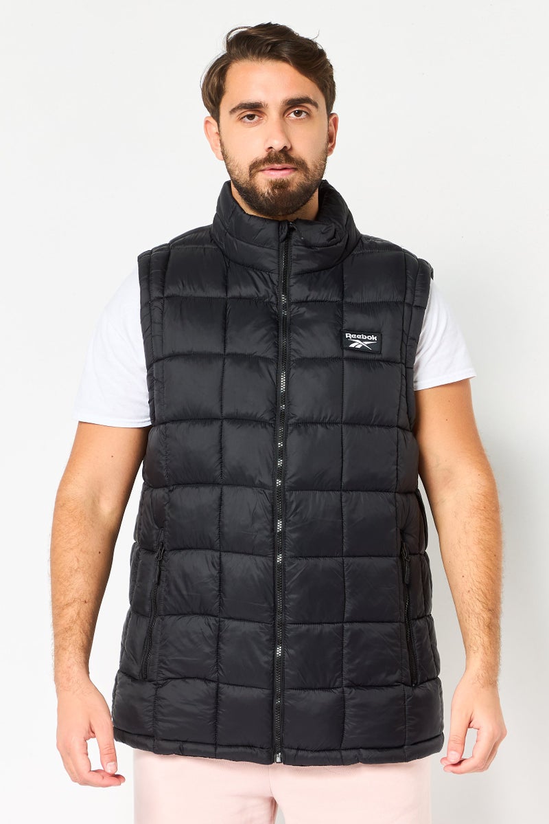 Reebok Men Sportswear Fit Sleeveless Outdoor Puffer vest Jacket, Black - Image 1