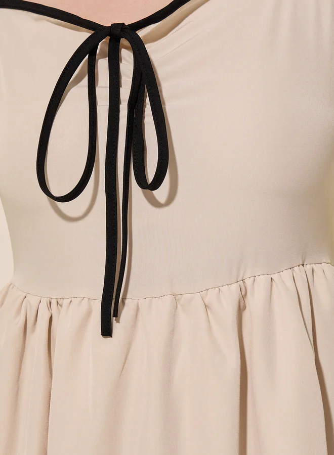 ستايلي Styli Beige Contrast Trim Bell Sleeves Tiered Maxi Dress
