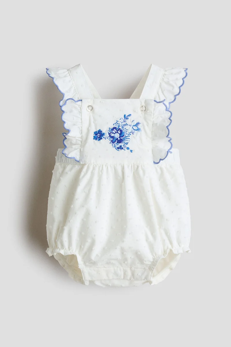 H&M Frill-trimmed cotton romper suit