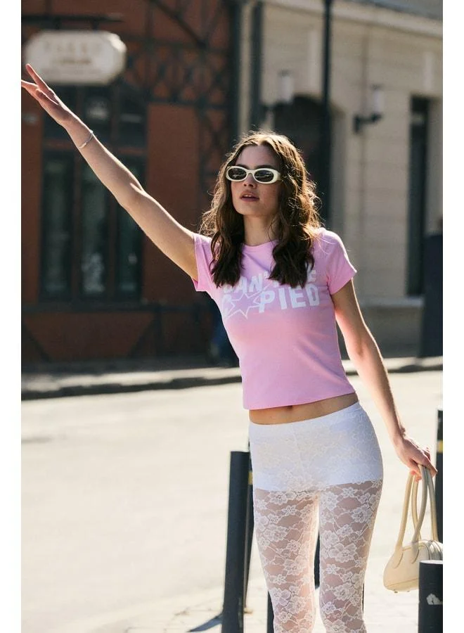 جريميلانج قميص T-Shirt وردي من SIRONA للنساء ناعم ومطاطي بقماش من القطن العضوي مع طبعة مفصلة.