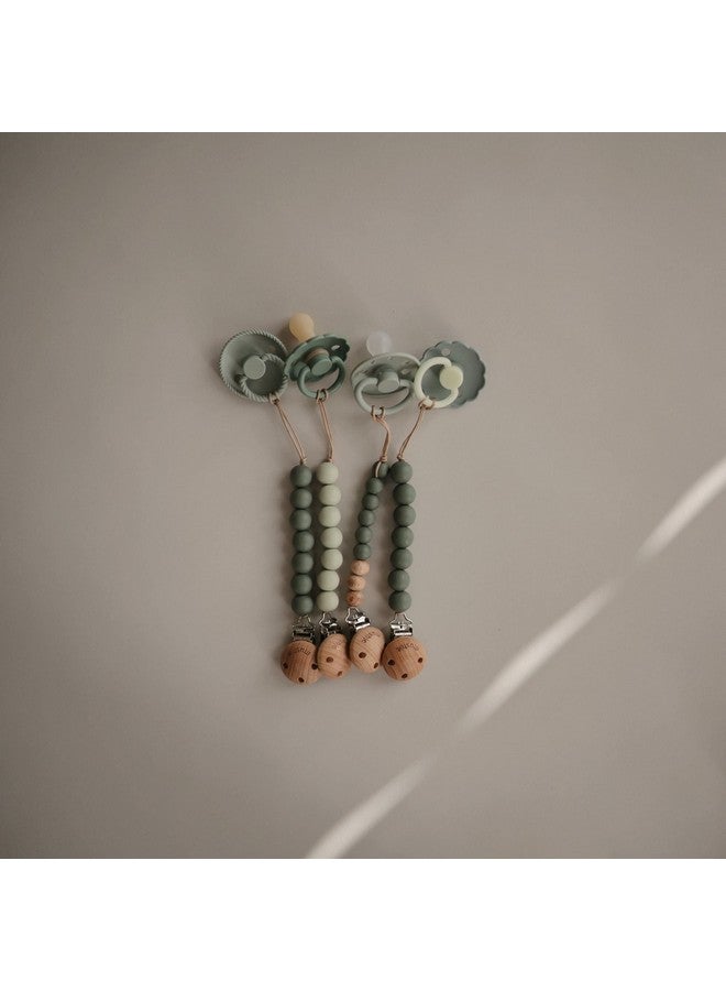 FRIGG ماصة أطفال من المطاط الطبيعي من مون ; مصنوعة في الدنمارك ; خالية من BPA (ساج / بورتوبيلو 618 شهر) 2 قطعة - Image 4