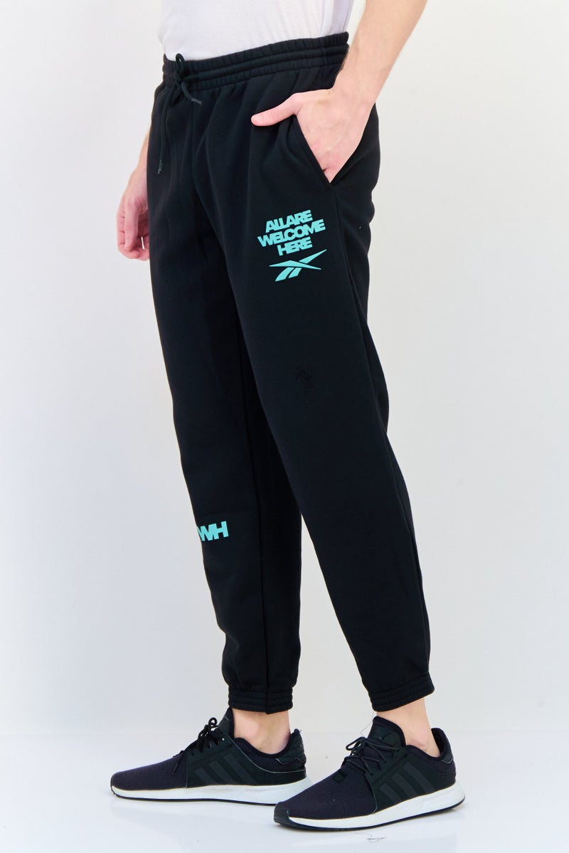 Reebok Men Sportswear Fit Outdoor Sweatpants, Black - Image 2