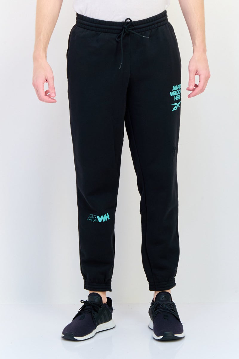 Reebok Men Sportswear Fit Outdoor Sweatpants, Black - Image 1