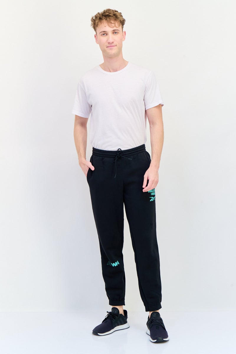 Reebok Men Sportswear Fit Outdoor Sweatpants, Black - Image 4