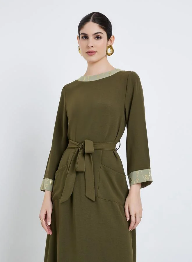 أميرة جلابية نسائية بتصميم خط  وطبعة زيتونية لامعة