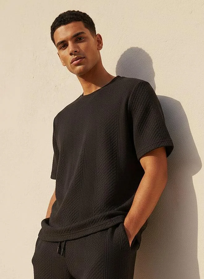 ايكونيك Iconic Men Regular Fit Crew Neck Short Sleeves Textured T shirt