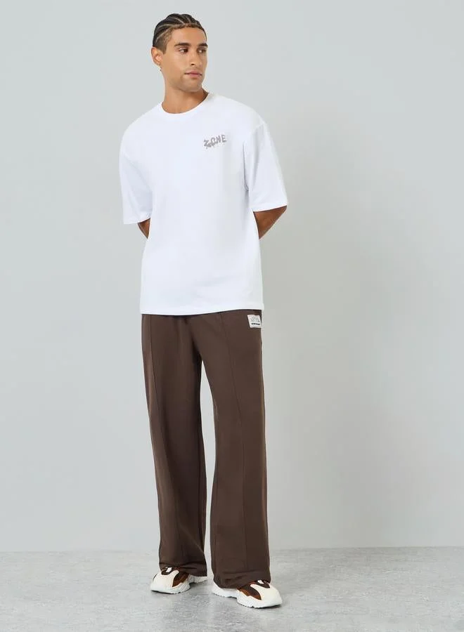 Styli Men White Oversized Graphic T-Shirt