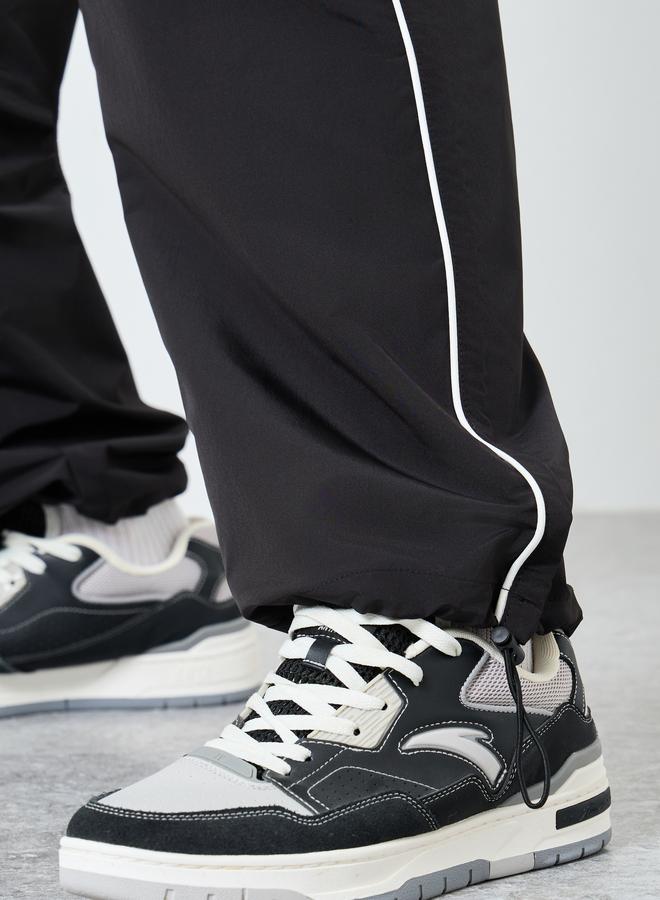 Styli Black Relaxed Fit Joggers with Side Piping and Placement Print - Image 4