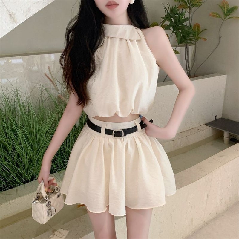 Women's 2-Piece Sleeveless Top and Pleated Skirt Set - Image 1
