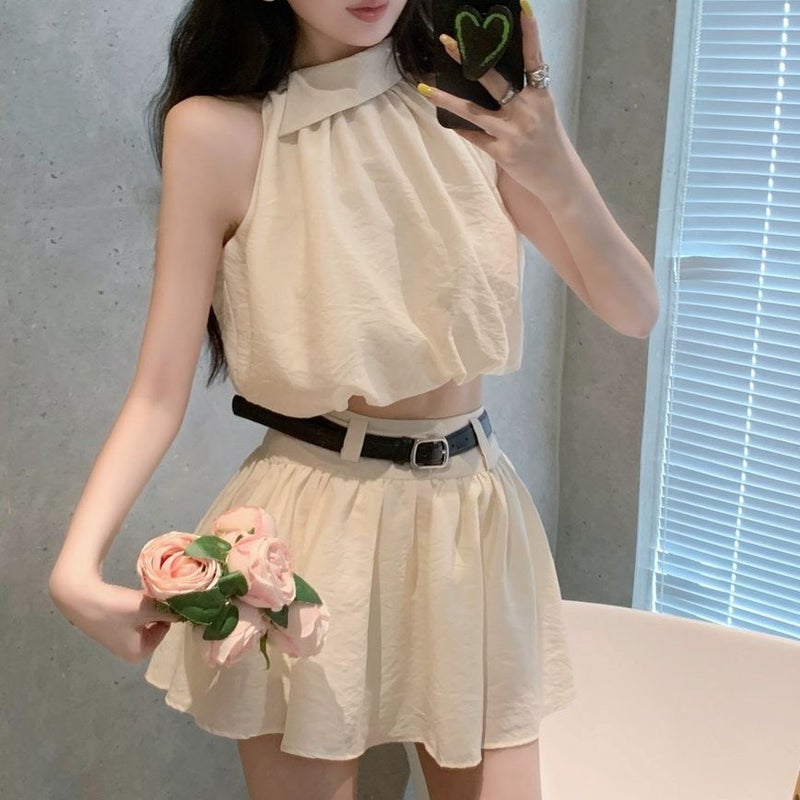 Women's 2-Piece Sleeveless Top and Pleated Skirt Set - Image 2