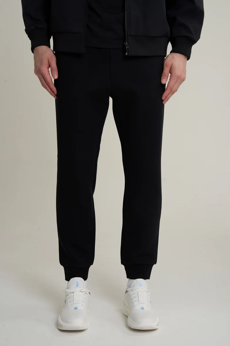 Anta TRN Essential Knit Track Pants