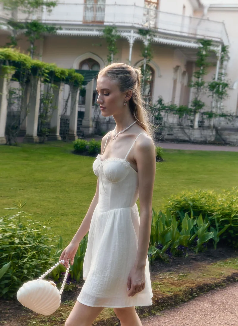 Lichi Mini strappy dress with lace ruffles on the bodice