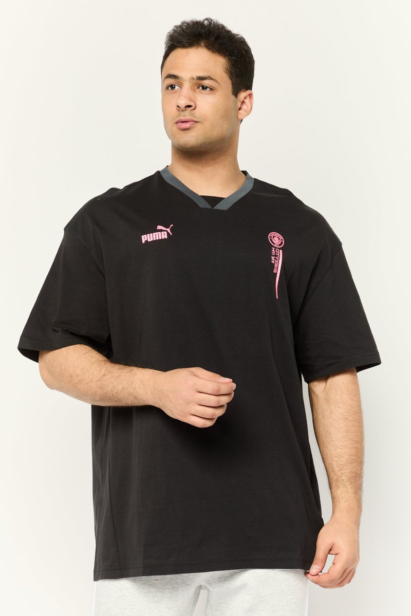 PUMA Men Sportswear Fit Short Sleeves Manchester City Football Culture T-shirt, Black - Image 1