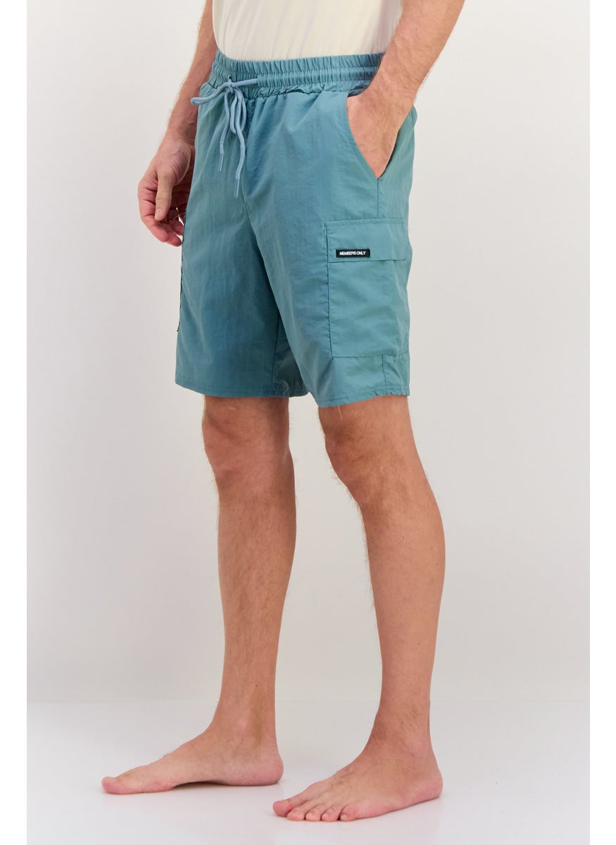 Men 8,5 Inseam Brand Logo Drawstring Swim Shorts, Slate Blue - pzsku/ZC3CC589160D100AB4DD7Z/45/_/1737642111/023e3d21-3fa6-46c6-8e7c-dd288c0bfbc6