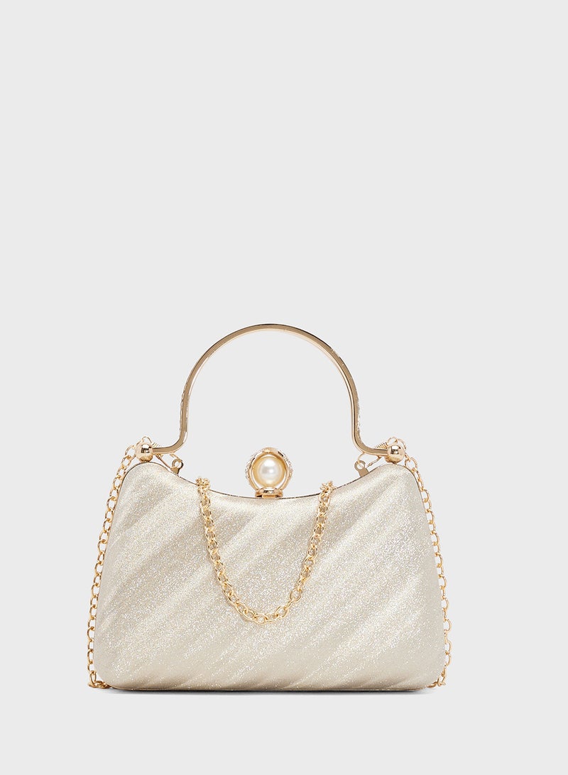 خزانة حقيبة يد ذهبية معدنية مزخرفة - Image 1