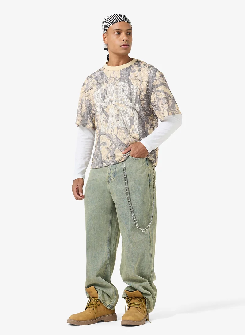 Karl Kani  Heritage Wood Camo Mesh Boxy Jersey for Men | Best Price UAE
