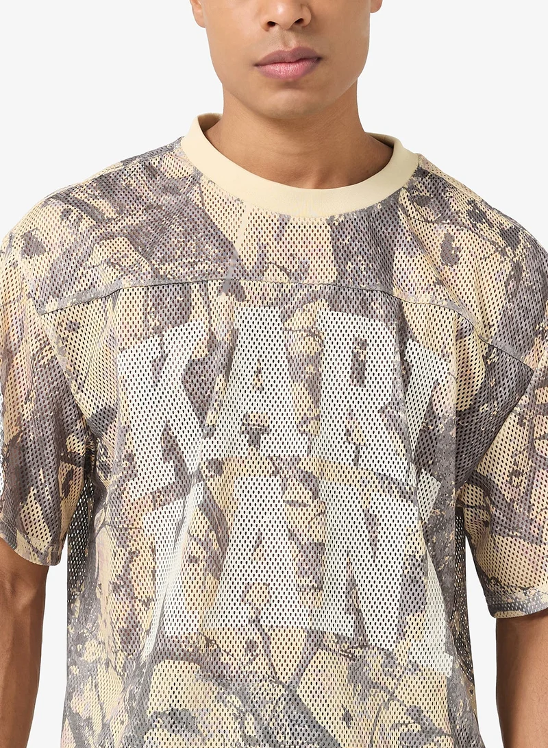 Karl Kani  Heritage Wood Camo Mesh Boxy Jersey for Men | Best Price UAE