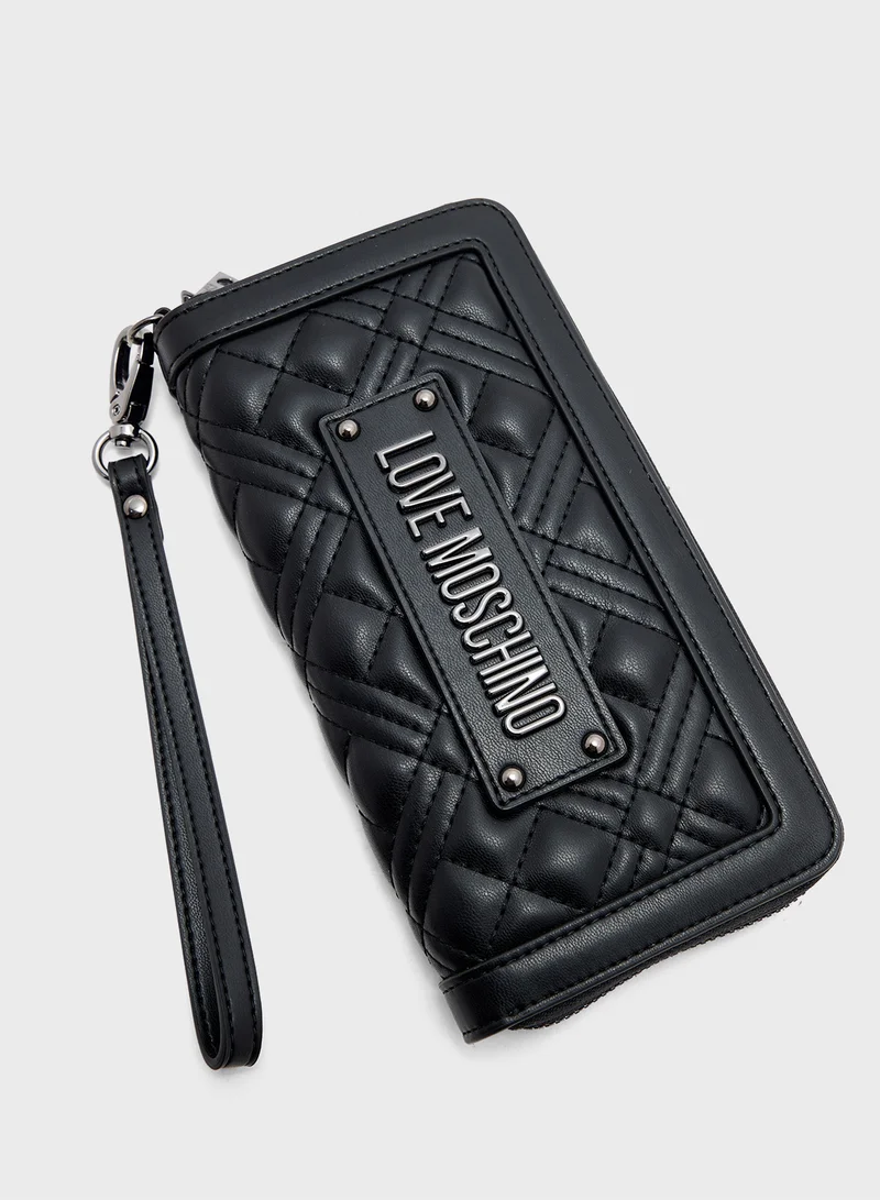 لوف موسكينو Quilted Zip Over Clutche