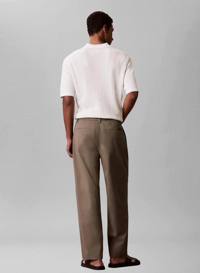Calvin Klein Jeans Dusty Olive Comfort Cotton Relaxed Chino Trousers for Men | Best Price UAE