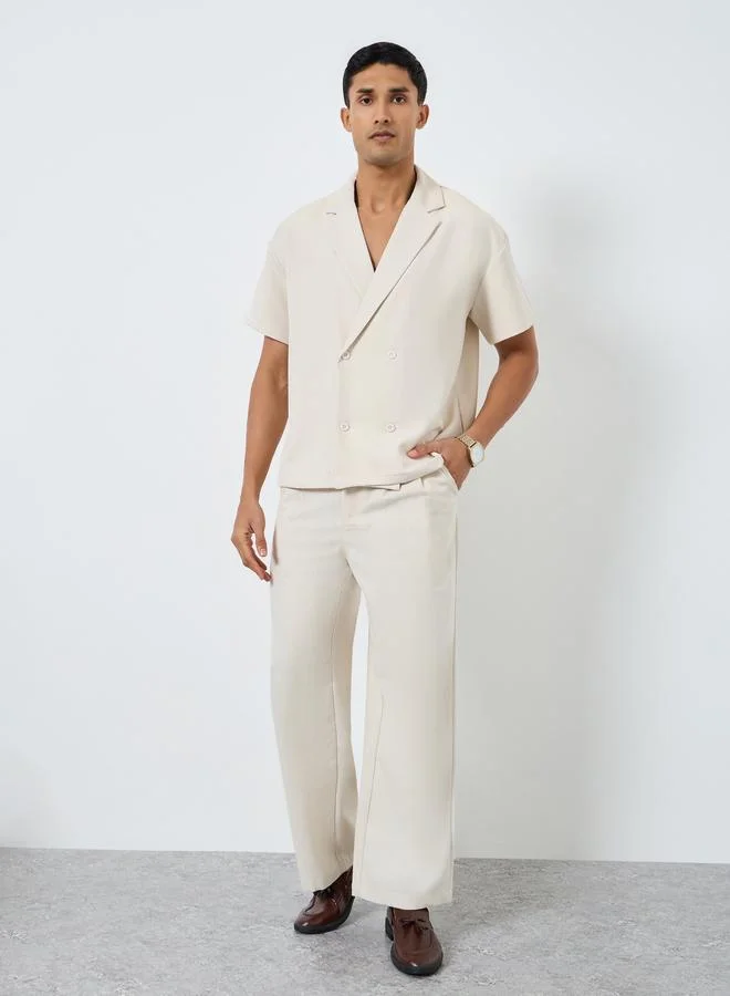 ستايلي قميص بصفين أزرار بقصة واسعة بياقة مطوية