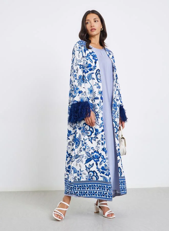 ستايلي عباية بطبعة زهور وأكمام بشراشيب