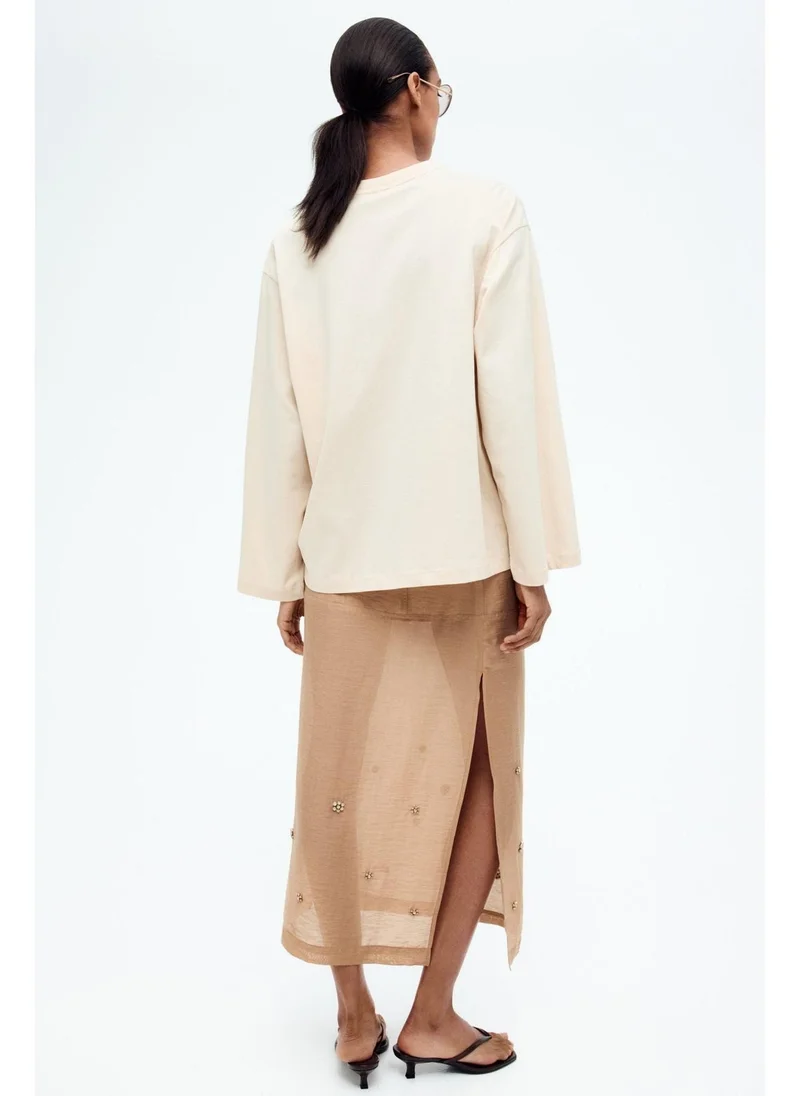 اتش اند ام بلوزة قطنية واسعة