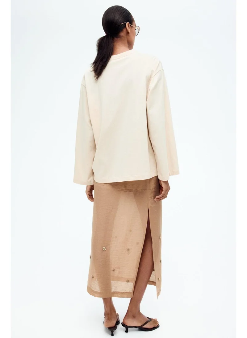 اتش اند ام بلوزة قطنية واسعة