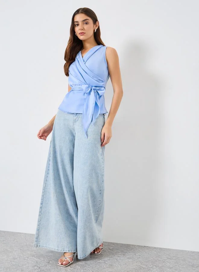 تايك تو بلوزة بنمط لف بلا أكمام