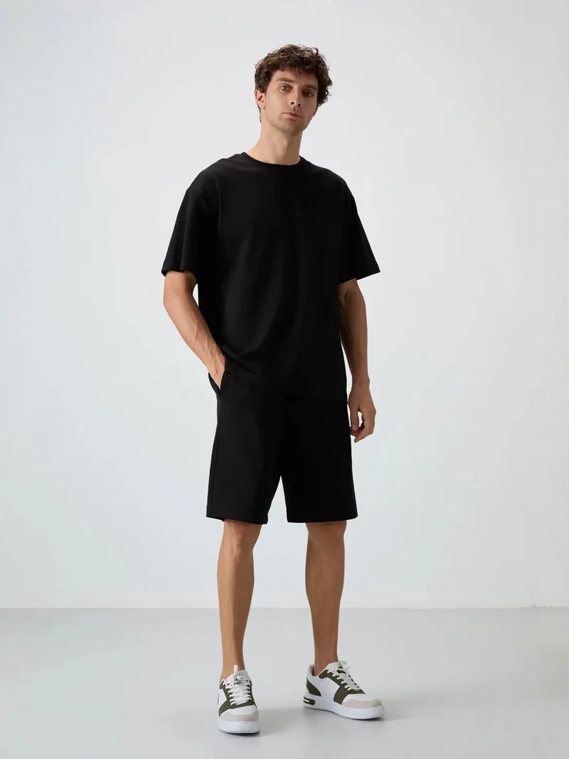 تومي لايف TOMMY Oversized T-Shirt And Shorts Set