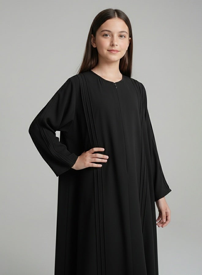 HAWRAA ABAYA Girls’ abaya with a semi-flared cut, featuring a zipper closure - Image 1