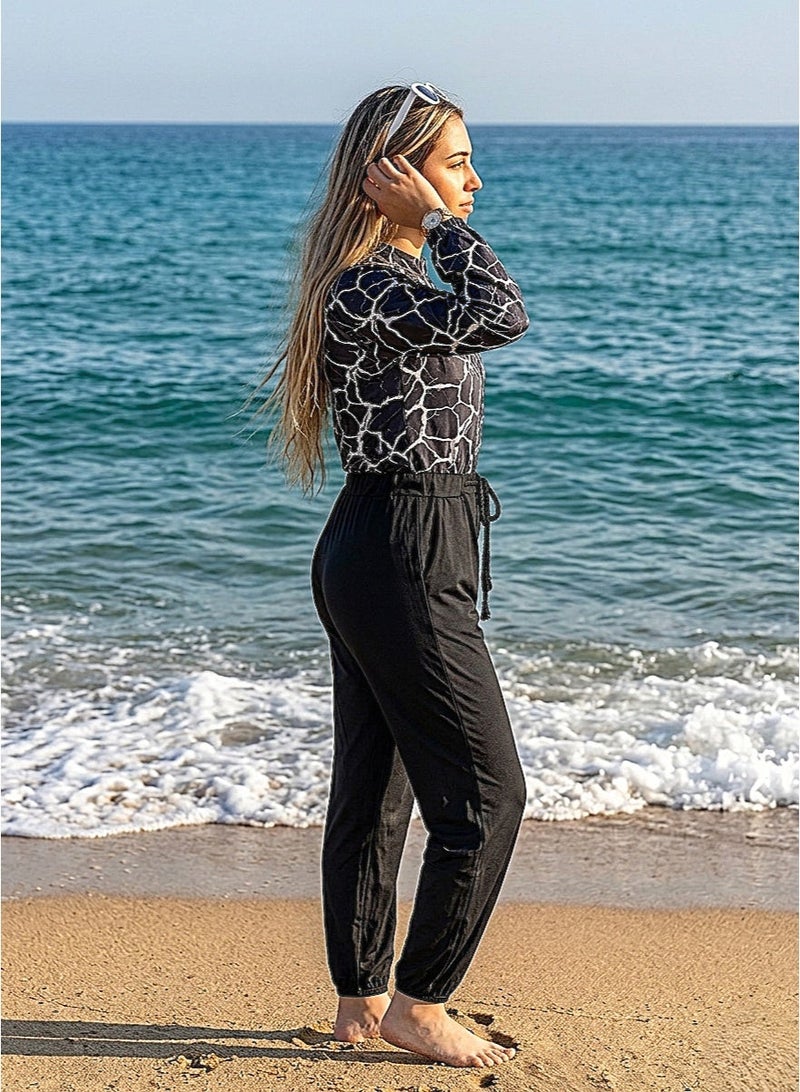 مايوه قطعة واحدة - جمبسوت سباحة أنيق بتصميم عصري وأرجل مكشكشة - Image 2