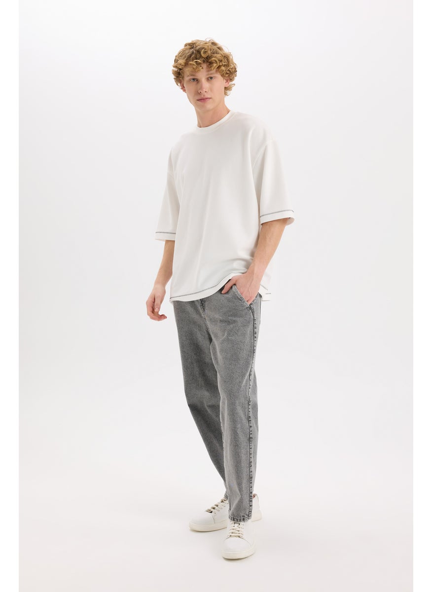 Man Relaxed Slouchy Fit Wide Leg Washed Jeans