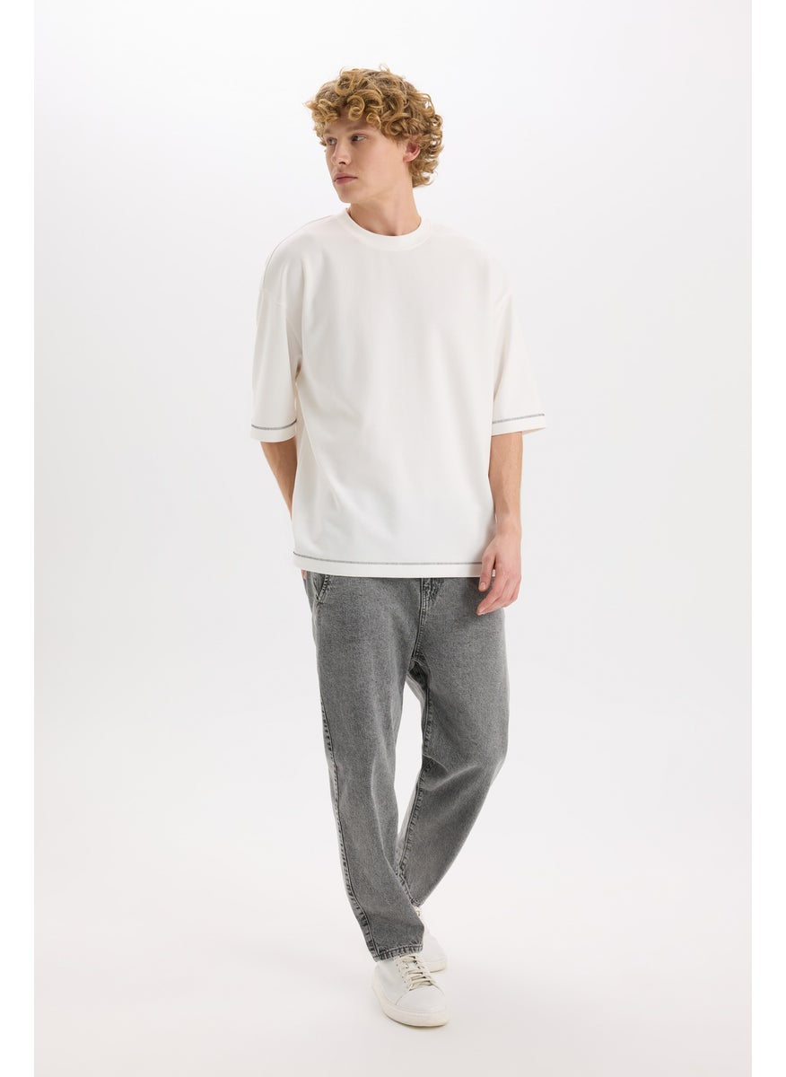 Man Relaxed Slouchy Fit Wide Leg Washed Jeans