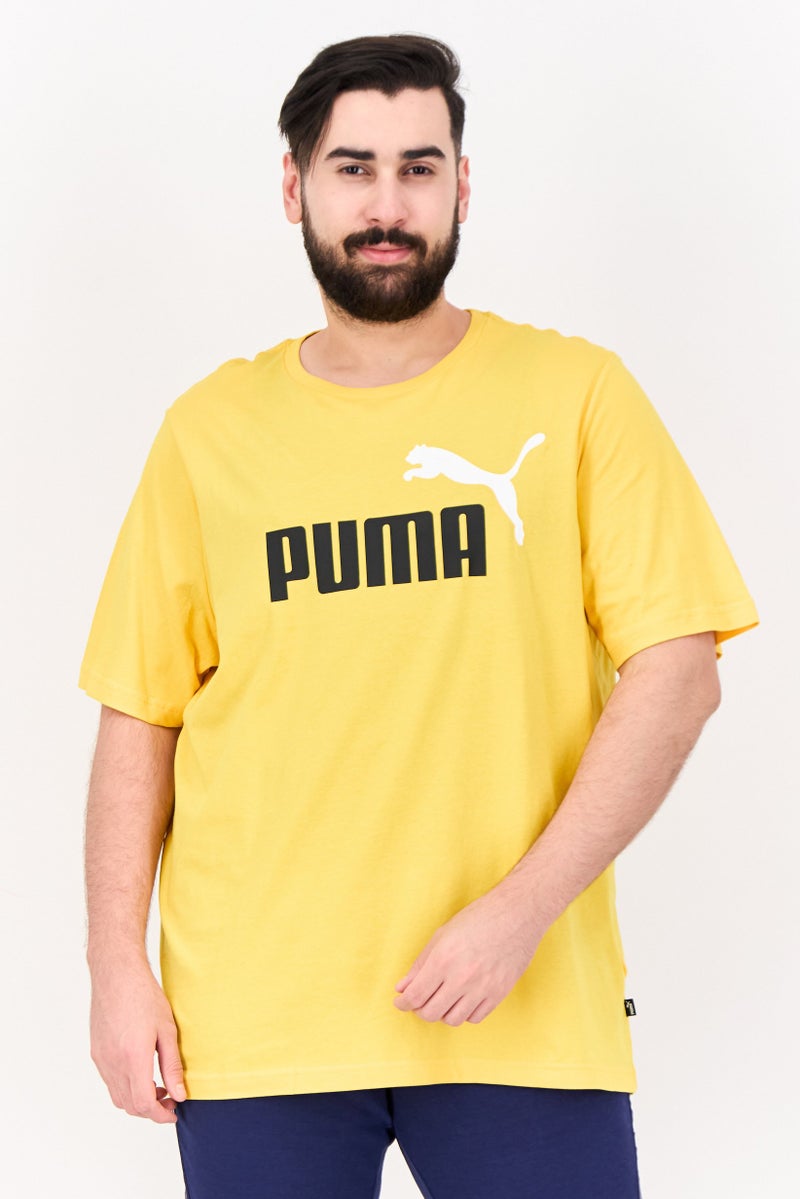 PUMA Men Sportswear Fit Training T-Shirt, Yellow - Image 1