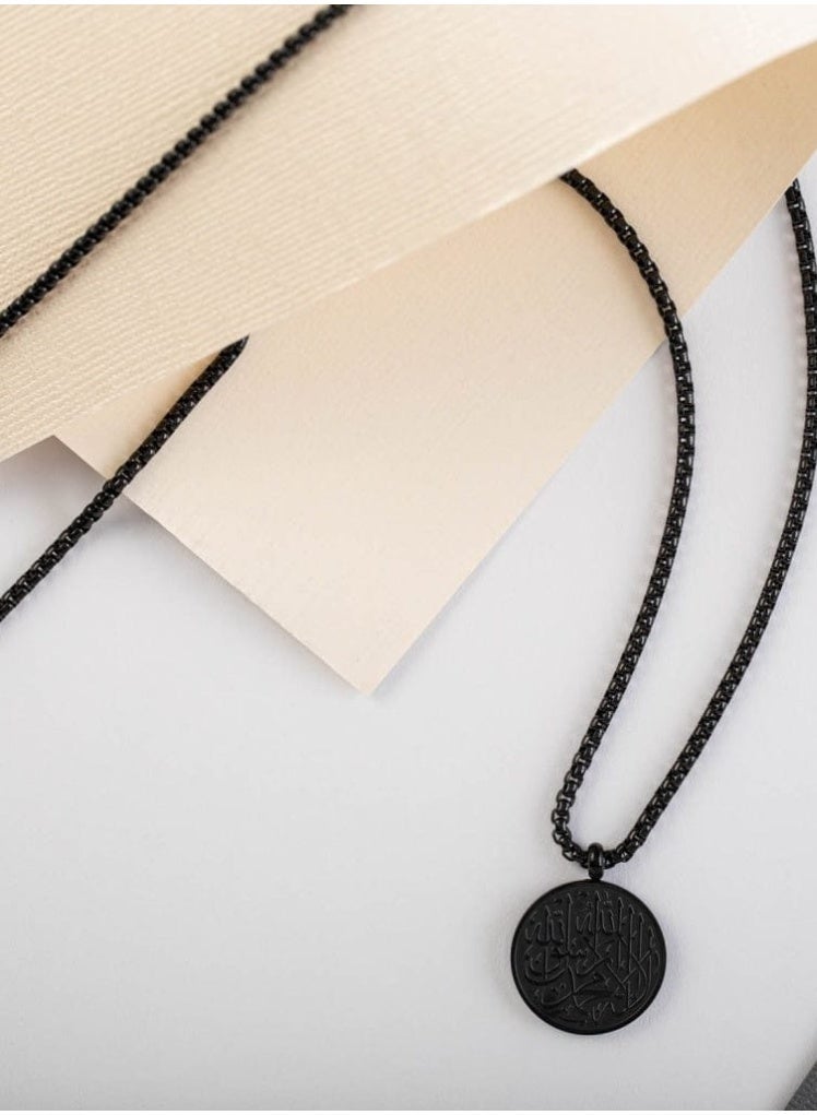 veya A luxurious circular pendant from VEYA made of stainless steel in an elegant black color, decorated with a highly detailed engraved Arabic inscription, and comes inside a luxurious package with a velvet pouch to protect the piece. - Image 3