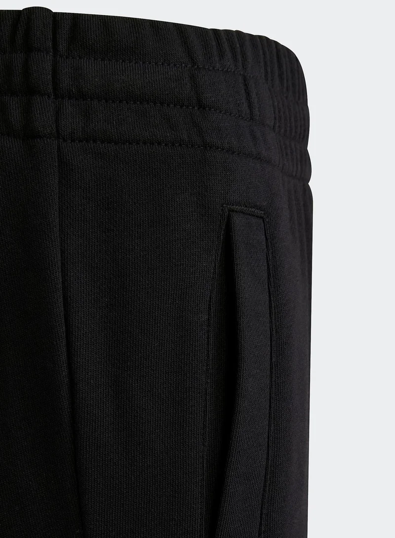 adidas بنطال رياضي بجيوب جانبية